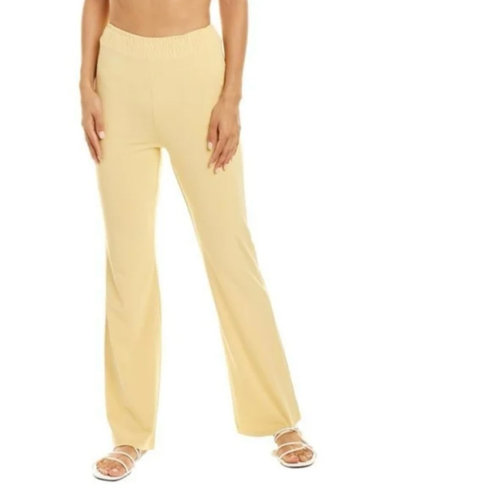 WeWoreWhat yellow smocked flare pant Jersey Knit sand